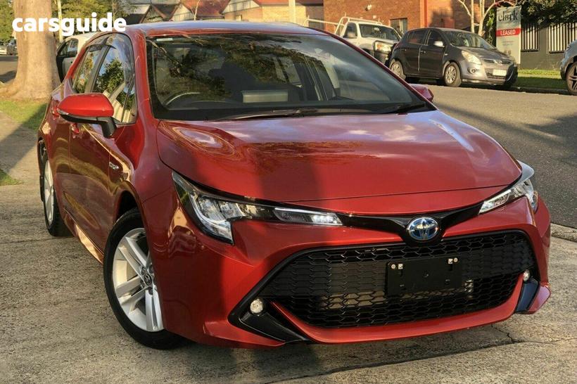 Orange 2018 Toyota Corolla Hatchback Sx (Hybrid)