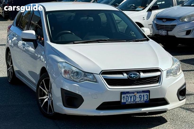 White 2012 Subaru Impreza Hatchback 2.0I (Awd)