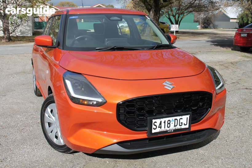 Orange 2025 Suzuki Swift Hatchback Hybrid