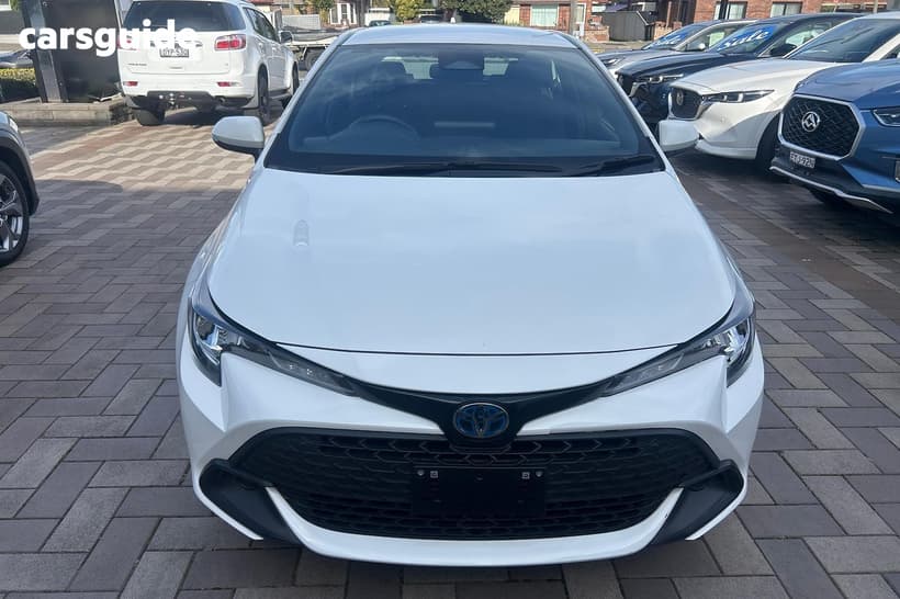White 2024 Toyota Corolla Hatchback Ascent Sport Hybrid