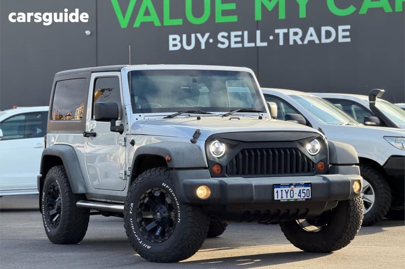 Silver 2010 Jeep Wrangler Softtop Sport (4X4)