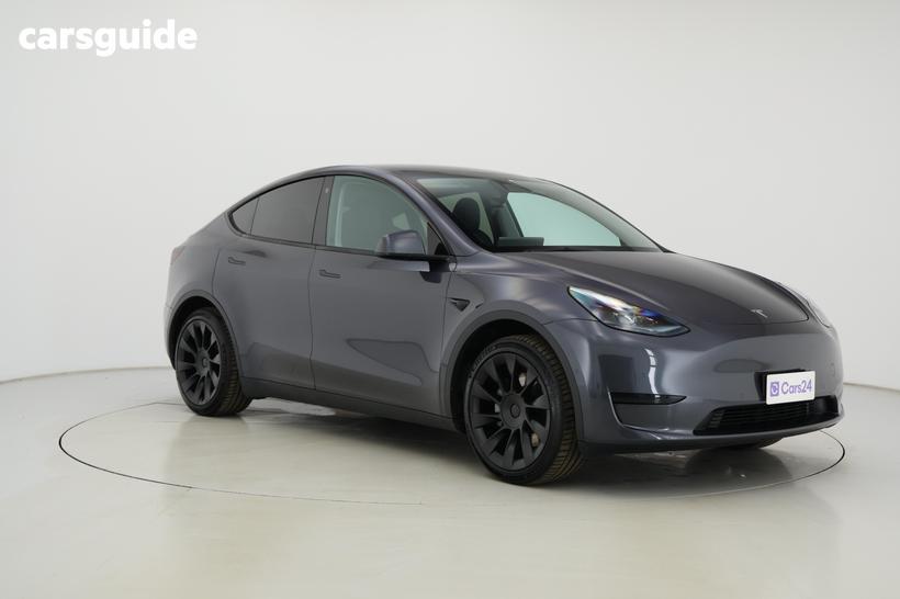 Silver 2023 Tesla Model Y Wagon Rear-Wheel Drive