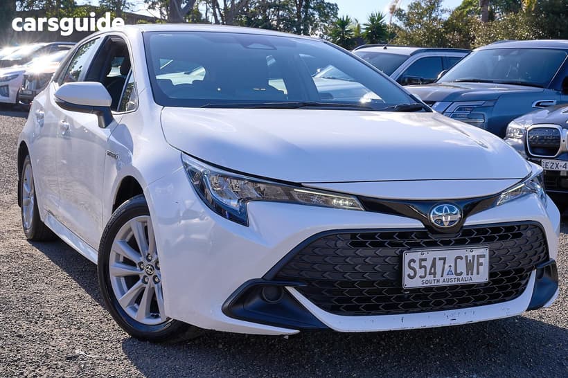 White 2023 Toyota Corolla Hatchback Ascent Sport Hybrid