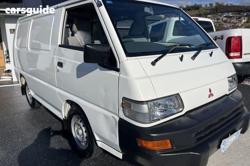 White 2010 Mitsubishi Express Commercial