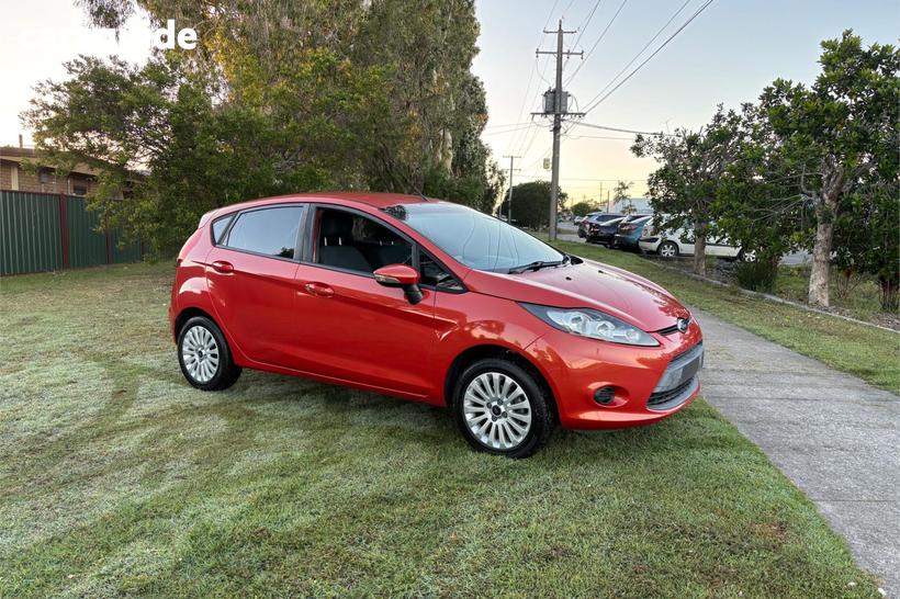 Orange 2010 Ford Fiesta Hatchback Lx