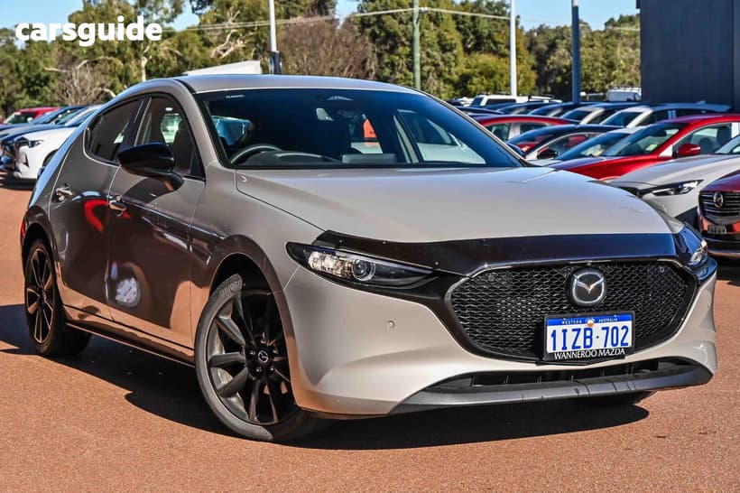 Beige 2025 Mazda Mazda3 Hatchback G25 Evolve Sp Vision
