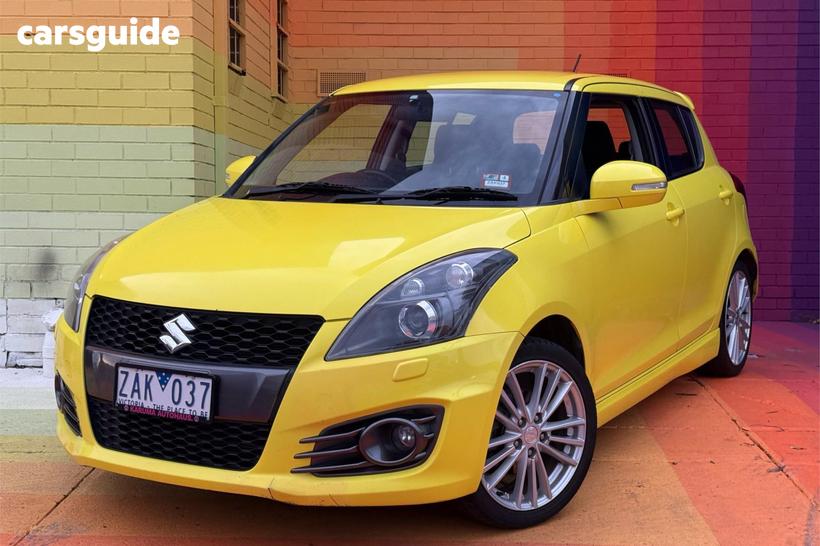 Yellow 2012 Suzuki Swift Hatchback Sport