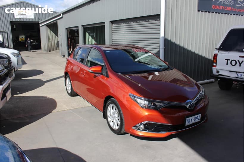 Orange 2015 Toyota Corolla Hatchback Ascent Sport
