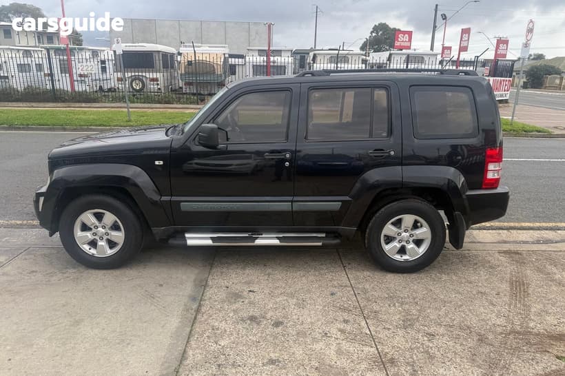 Black 2010 Jeep Cherokee Wagon Sport (4X4)