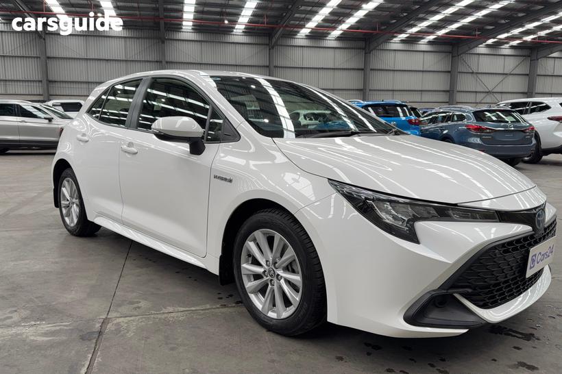 White 2023 Toyota Corolla Hatchback Ascent Sport Hybrid