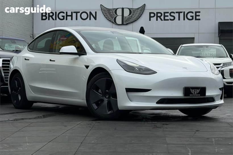 White 2021 Tesla Model 3 Sedan Standard Range Plus Rwd