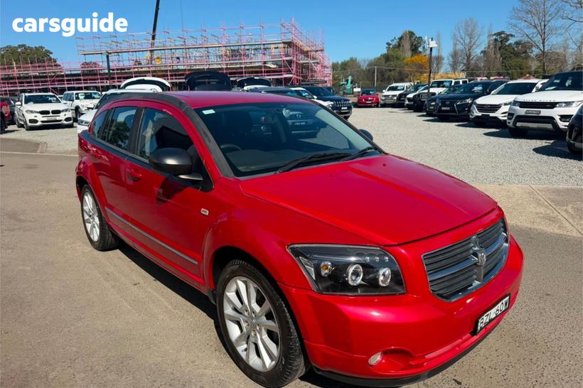 Red 2011 Dodge Caliber Hatchback Sxt
