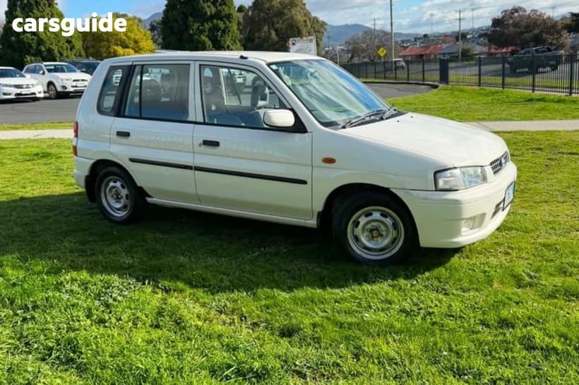 White 1999 Mazda 121 Hatchback Metro Shades