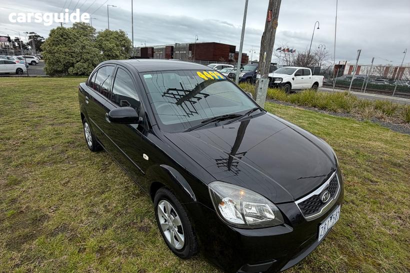 Black 2011 Kia RIO Sedan Si