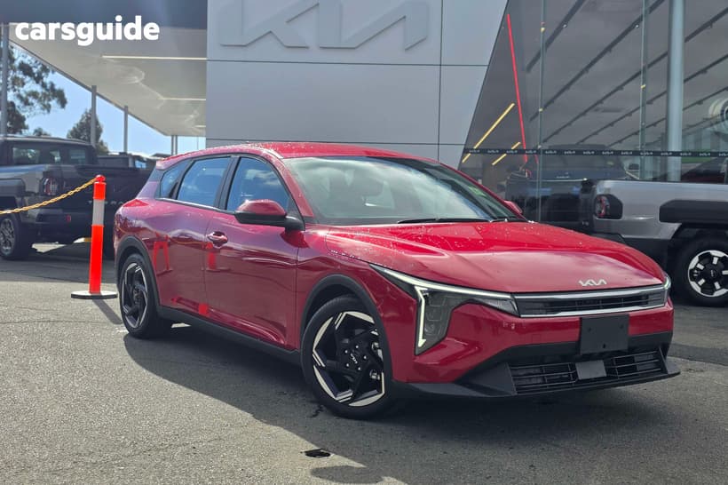 Red 2025 Kia K4 Hatchback Sport+