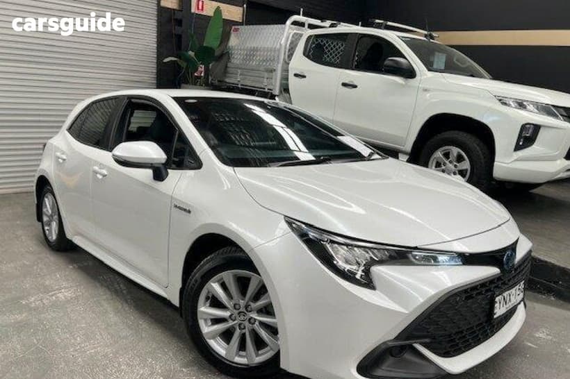 White 2023 Toyota Corolla Hatchback Ascent Sport Hybrid