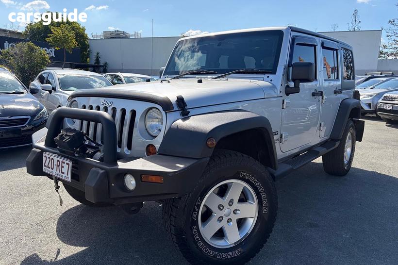 Silver 2012 Jeep Wrangler Softtop Unlimited Sport (4X4)