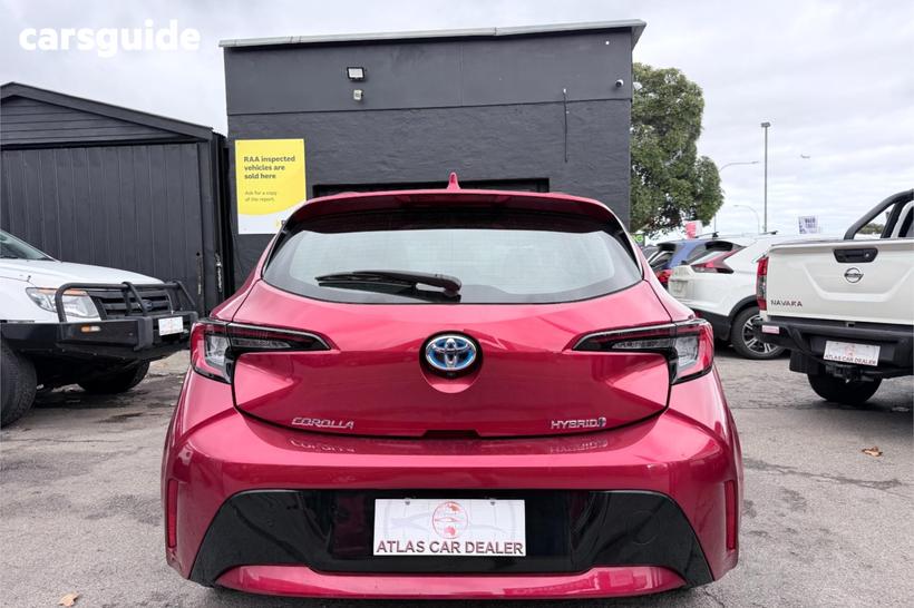 Red 2023 Toyota Corolla Hatchback Ascent Sport Hybrid