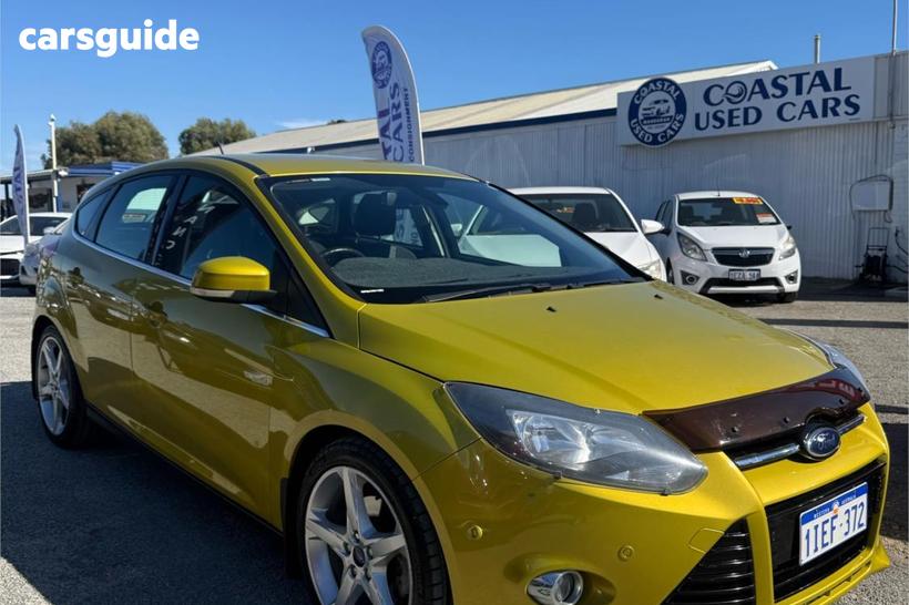 Yellow 2011 Ford Focus Hatchback Titanium
