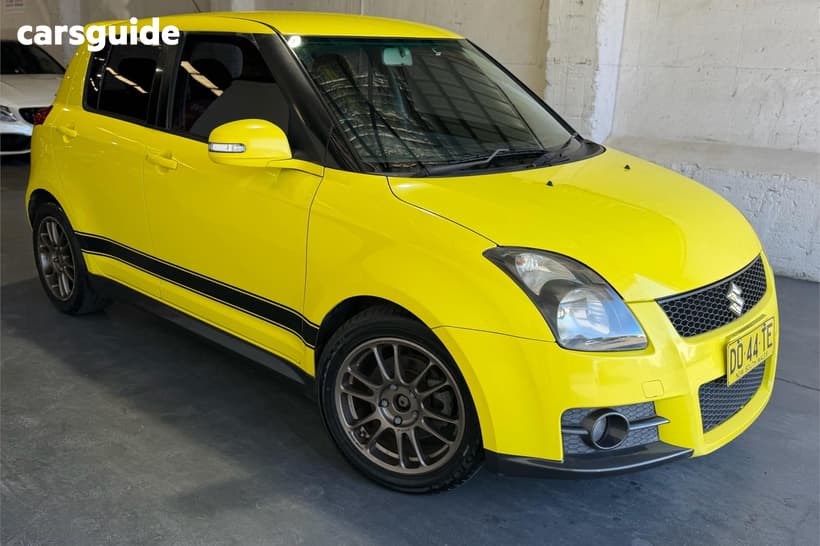 Yellow 2010 Suzuki Swift Hatchback Sport