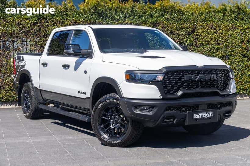 White 2025 RAM 1500 Crew Cab Utility Rebel Hurricane