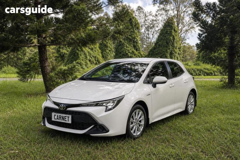 White 2023 Toyota Corolla Hatchback Ascent Sport + Conv Pk Hybrid