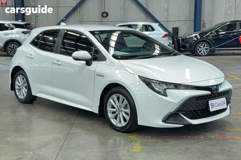 White 2023 Toyota Corolla Hatchback Ascent Sport Hybrid