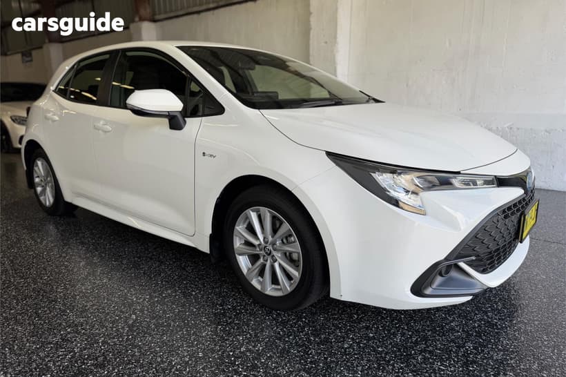 White 2025 Toyota Corolla Hatchback Ascent Sport + Conv Pk Hybrid