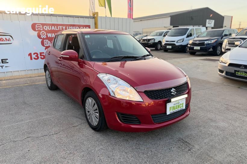 Red 2014 Suzuki Swift Hatchback Gl