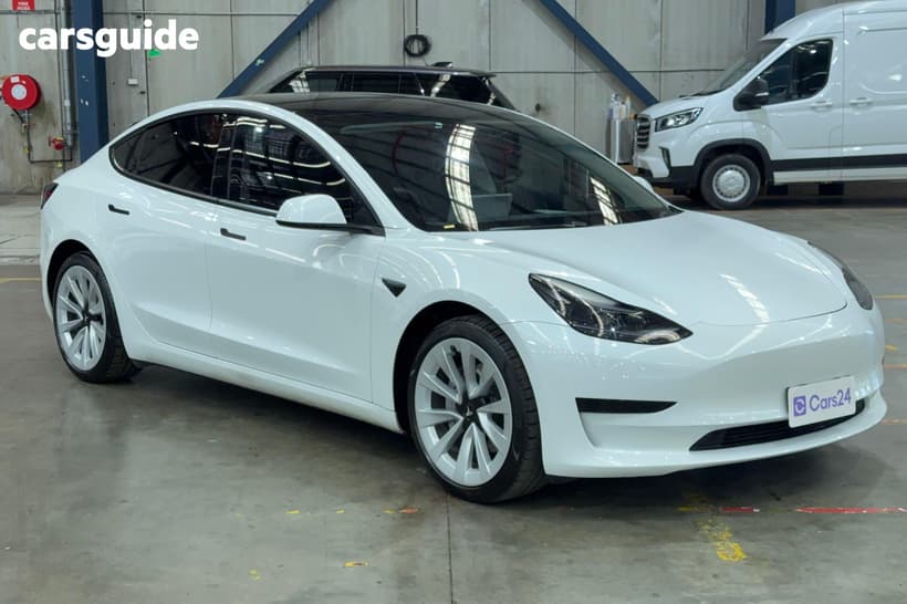 White 2021 Tesla Model 3 Sedan Standard Range Plus Rwd