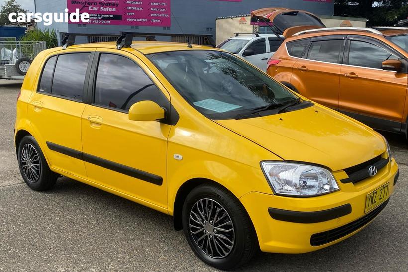 Yellow 2003 Hyundai Getz Hatchback Gl