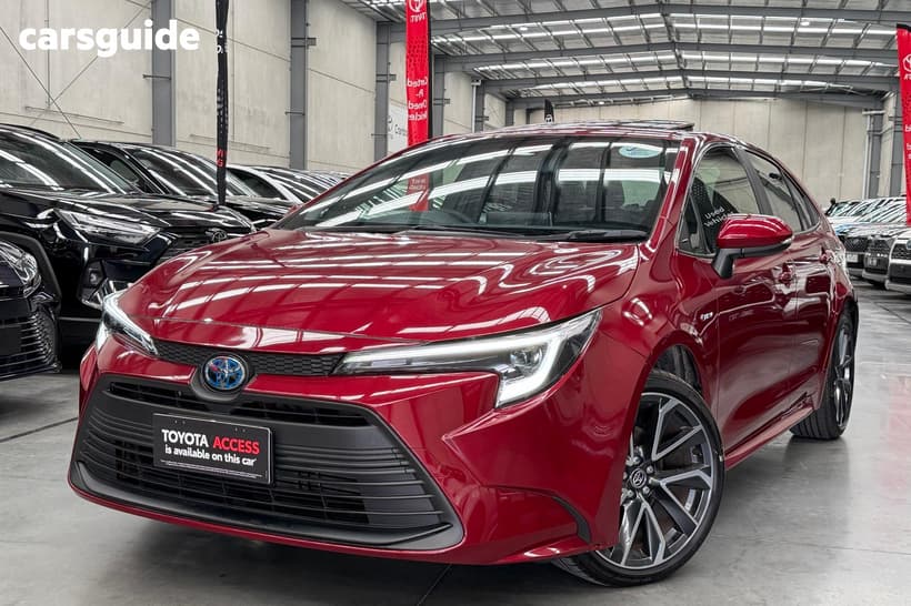 Red 2025 Toyota Corolla Sedan Zr Hev