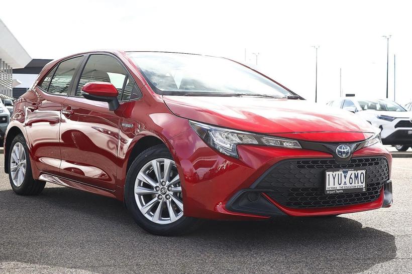 Red 2023 Toyota Corolla Hatchback Ascent Sport Hybrid
