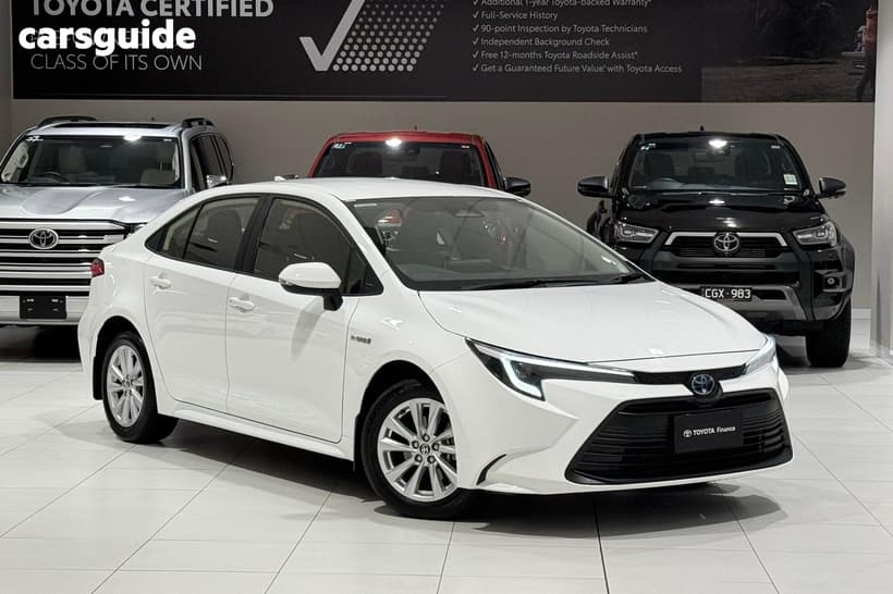 White 2023 Toyota Corolla Sedan Ascent Sport Hybrid