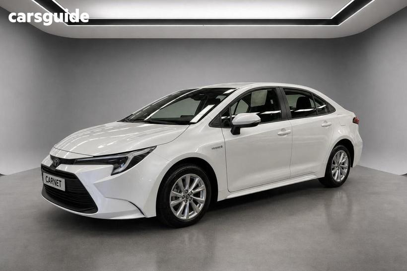 White 2023 Toyota Corolla Sedan Ascent Sport + Conv Pk Hybrid