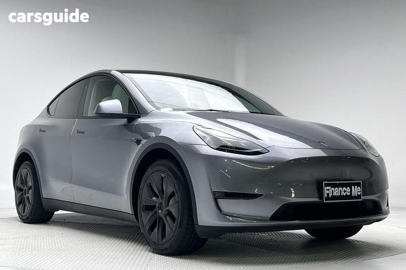 Silver 2025 Tesla Model Y Wagon Long Range