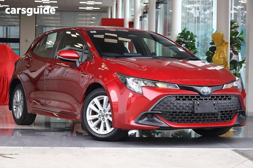 Red 2023 Toyota Corolla Hatchback Ascent Sport Hybrid