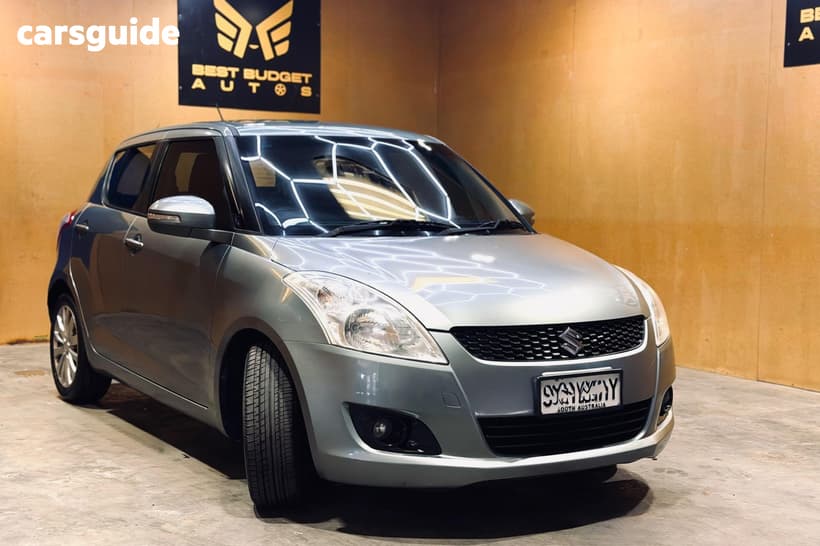 Green 2011 Suzuki Swift Hatchback Ga