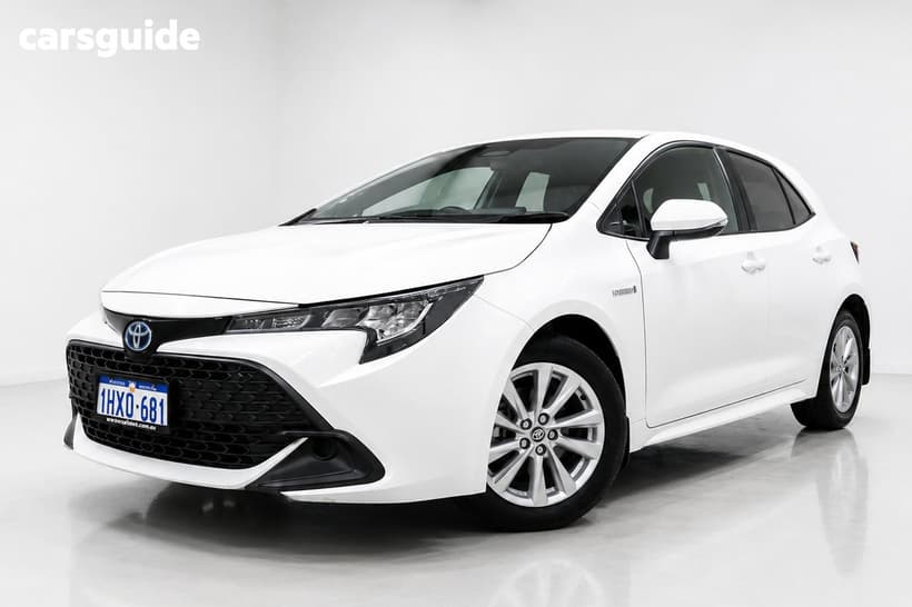 White 2023 Toyota Corolla Hatchback Ascent Sport + Conv Pk Hybrid