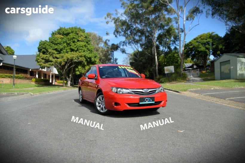 Red 2010 Subaru Impreza Sedan R (Awd)