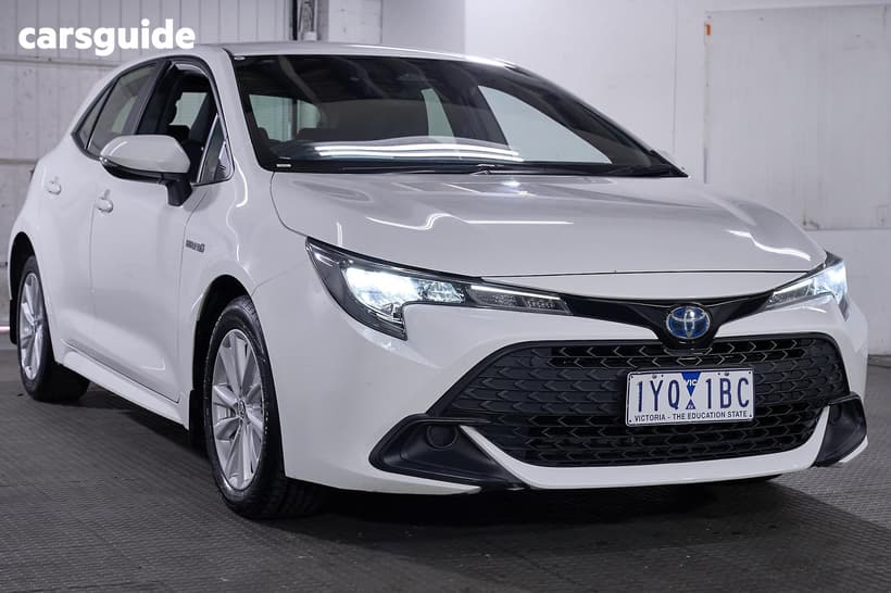 White 2023 Toyota Corolla Hatchback Ascent Sport Hybrid