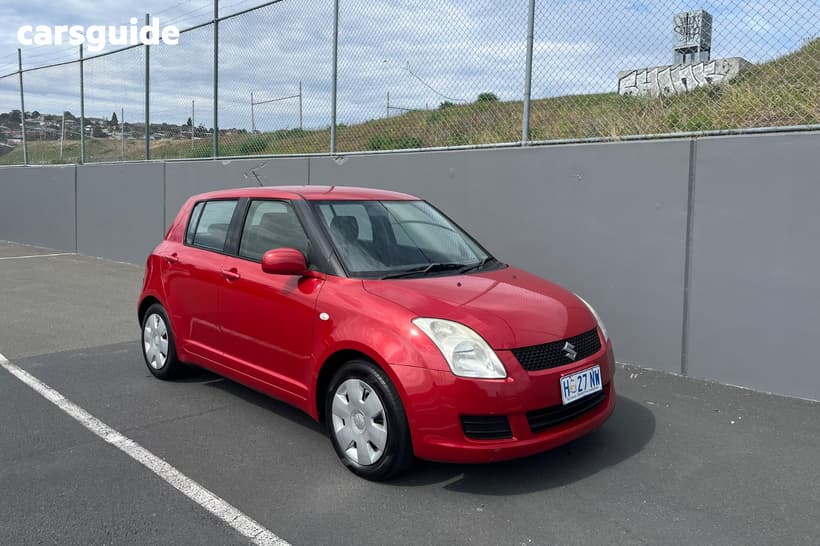 Red 2009 Suzuki Swift Hatchback