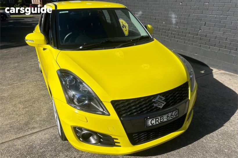 Yellow 2013 Suzuki Swift Hatchback Sport