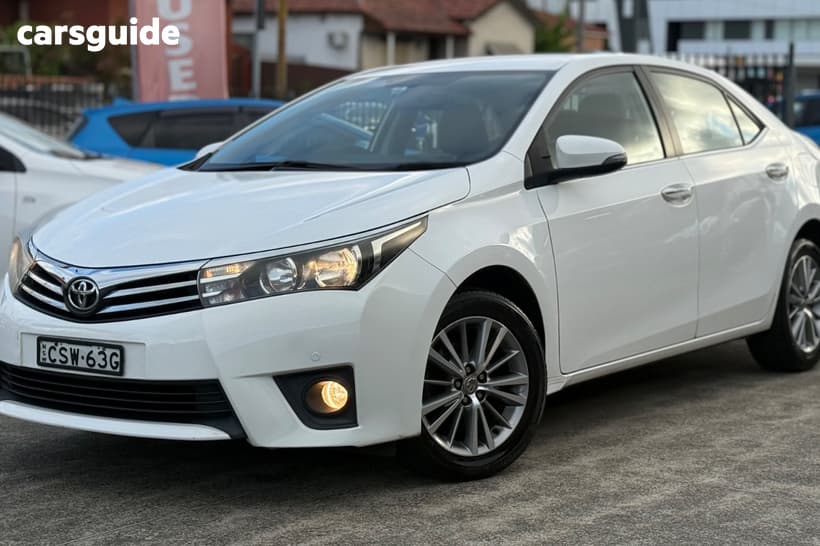White 2014 Toyota Corolla Sedan Sx